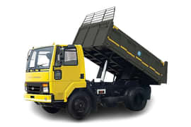 A yellow Ashok Leyland Ecomet 1015 truck price for dumper with hydraulic lift and sturdy frame
