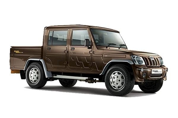 Mahindra Bolero Camper A chocolate colour Bolero Camper pickup with dual tone finish designed for tough road conditions