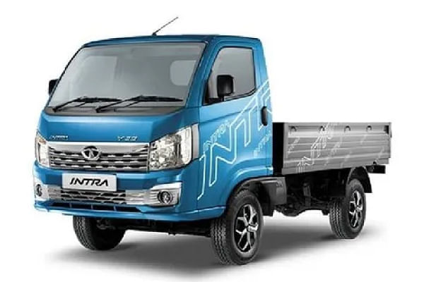 Tata Intra V30 A shiny blue Tata Intra V30 with a four-cylinder diesel engine and electric power steering, balancing power and efficiency