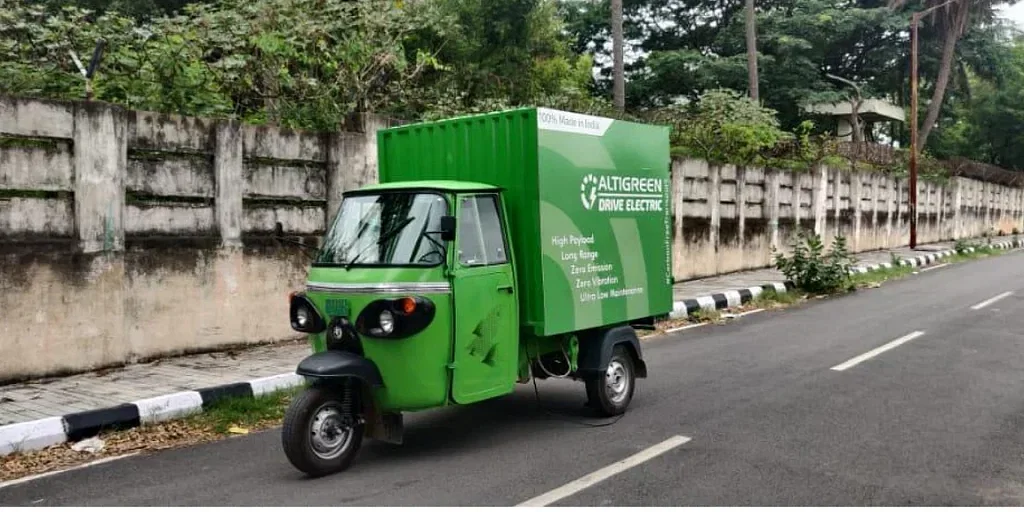 Altigreen electric three wheeler on road image